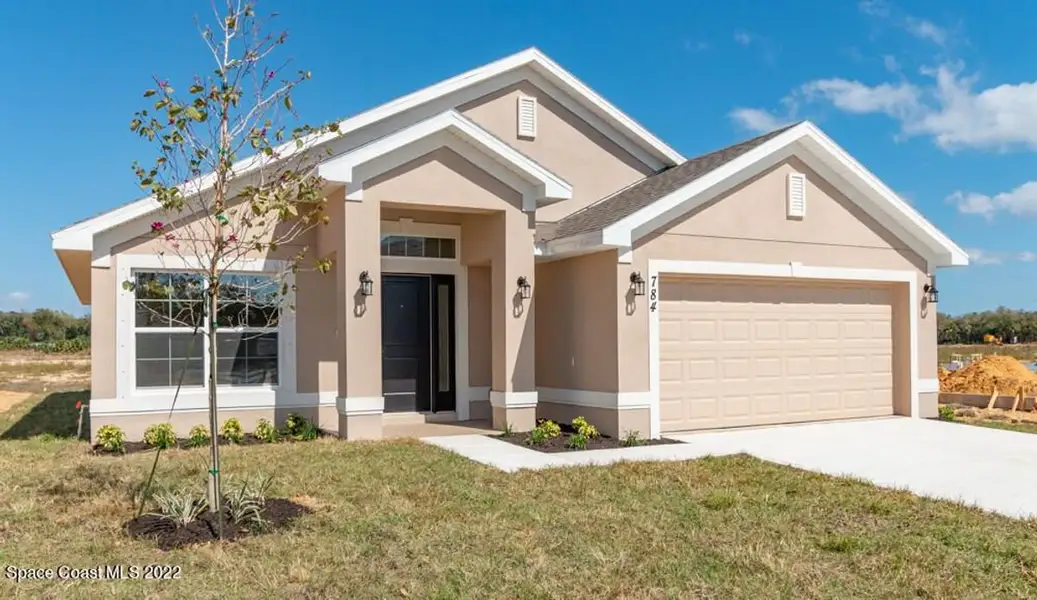 Representative exterior photo of a completed home built from the 1485 by Adams Homes in Winding Oaks, Weeki Wachee, FL (Image 19). Representative exterior photo of a completed home built from the 1485 by Adams Homes in Winding Oaks, Weeki Wachee, FL (Image 19).