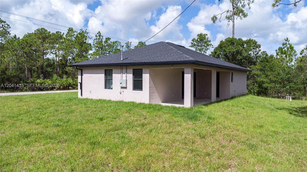 Exterior details and patio area of a home in , Lehigh Acres (Image 27).