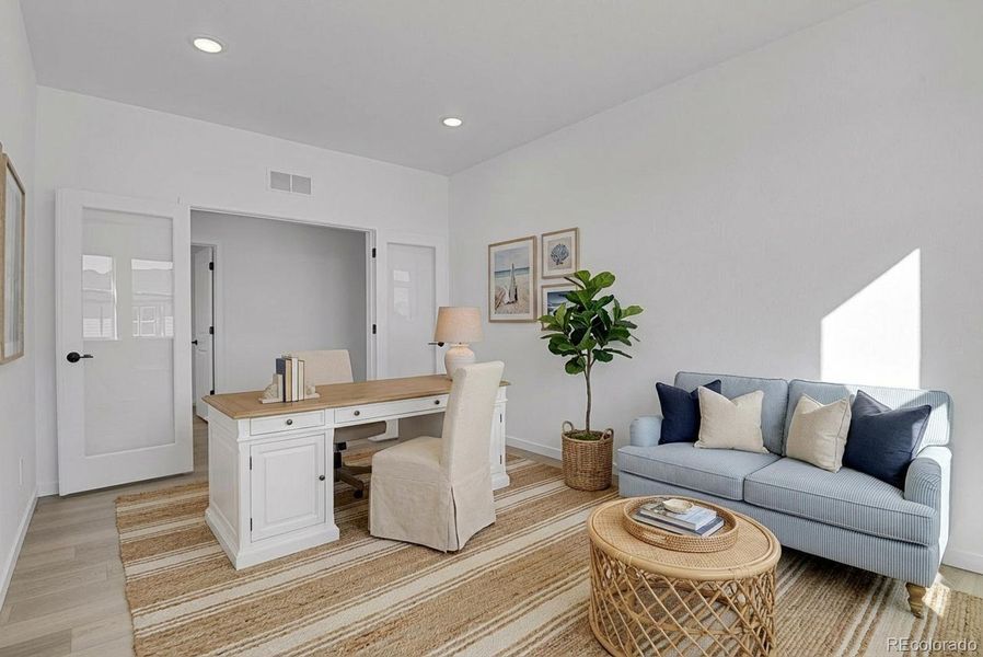 Den/office on the main level virtually staged