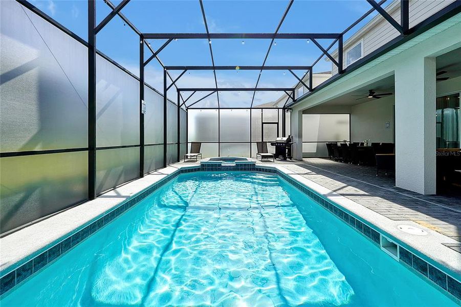 Exterior details and patio area of a home in Windsor Island Resort, Davenport (Image 26).