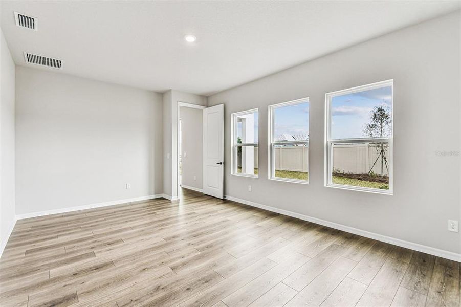Spacious, unfurnished interior of a new home in Oakfield at Mount Dora Village Series, Mount Dora (Image 33).