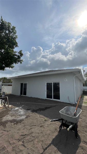 Front exterior of a new home in , Homestead, FL, highlighting curb appeal (Image 13).
