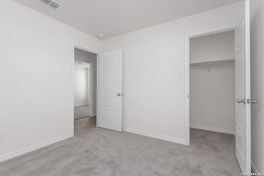 Spacious, unfurnished interior of a new home in Hidden Bluffs at TRP, San Antonio (Image 6).
