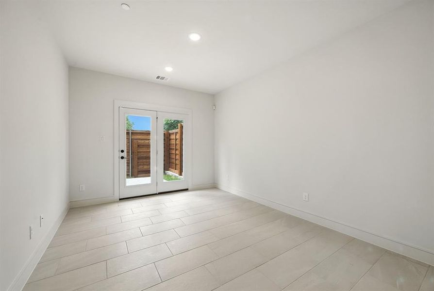 The main floor flex room is perfect for a home gym or office! The main floor flex room is perfect for a home gym or office!