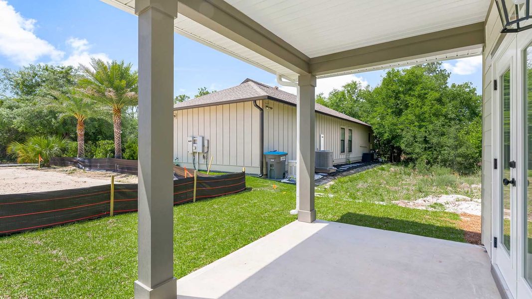 Exterior details and patio area of a home in Sanctuary Beach, Panama City Beach (Image 4).