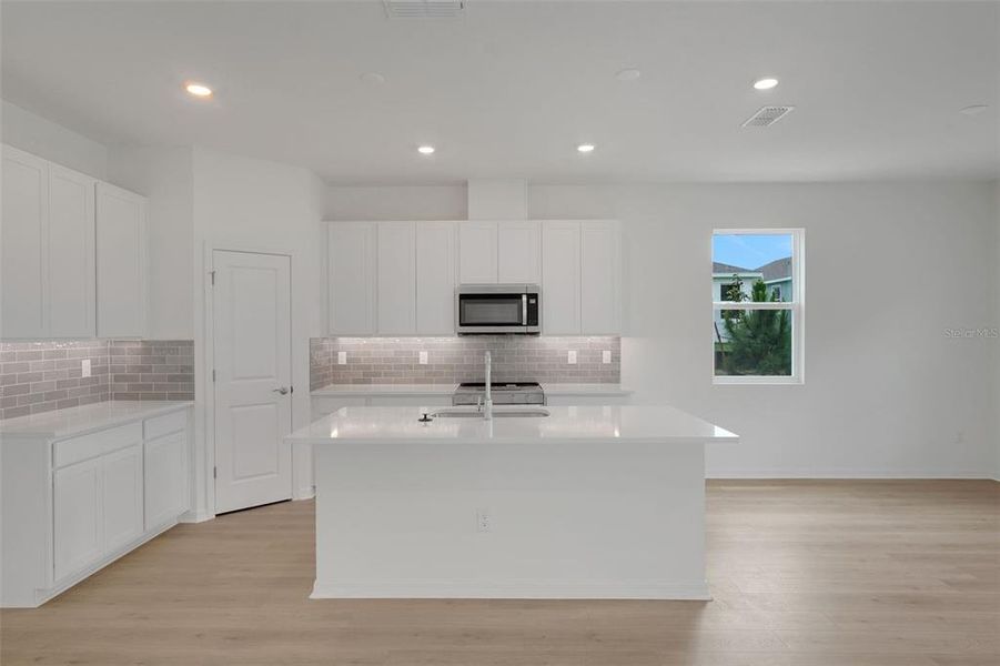 Furnished interior view inside a new home in Tuscan Hills, Dade City (Image 12).
