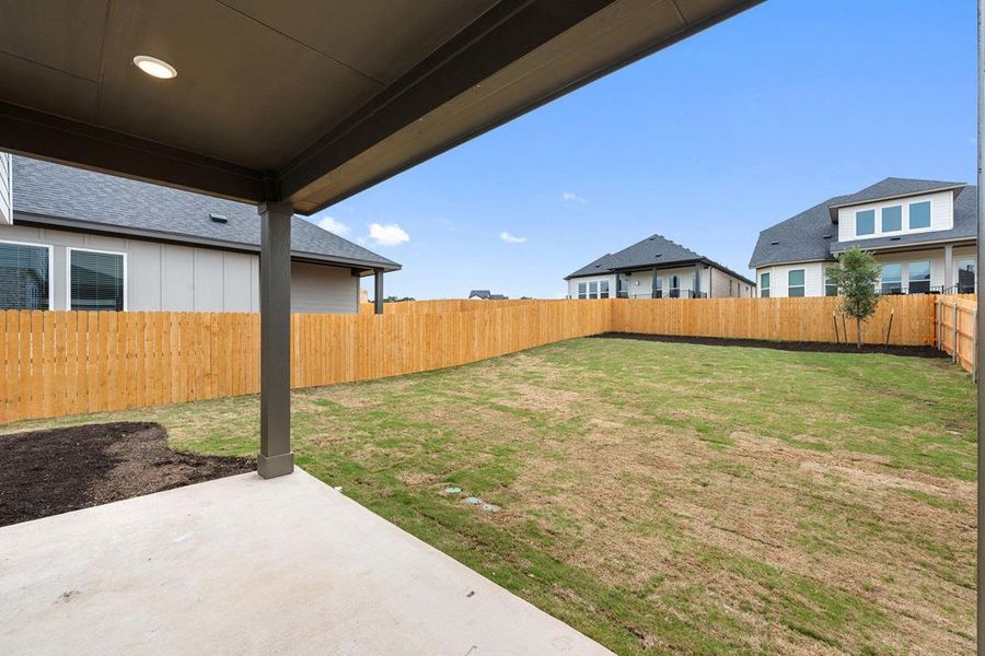 Exterior details and patio area of a home in Heritage, Dripping Springs (Image 3).