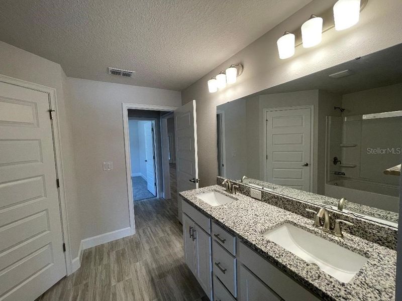 Furnished interior view inside a new home in Abbey Glen, Dade City (Image 8).