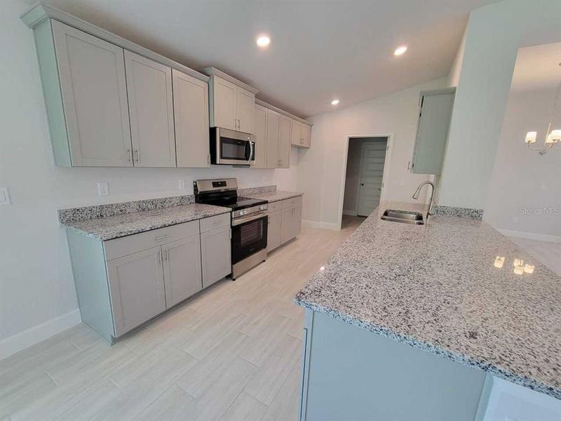 Furnished interior view inside a new home in Ocala Crossings South, Ocala (Image 5).