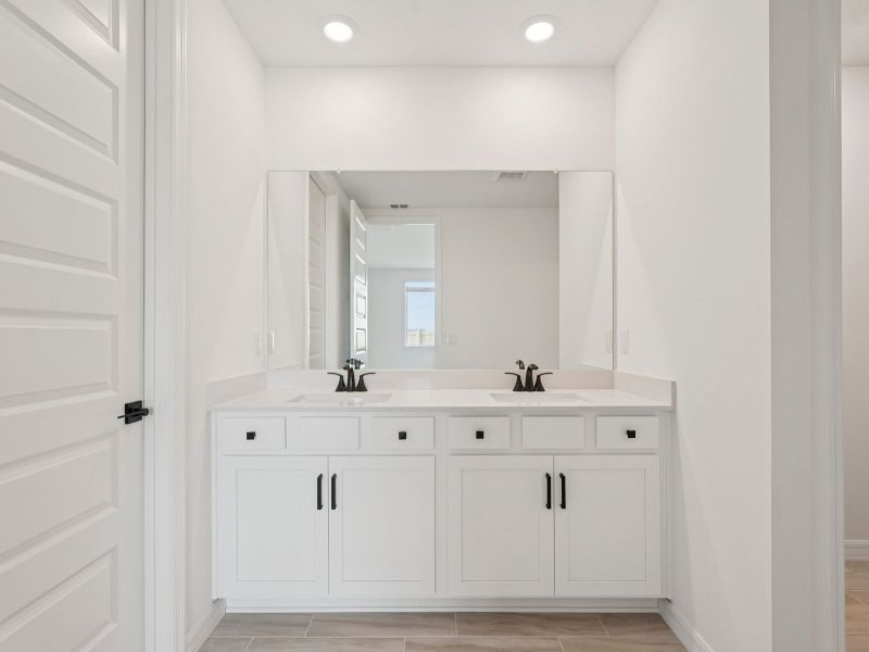 Furnished interior view inside a new home in Oakfield Trails - Signature Series, Parrish (Image 7). Furnished interior view inside a new home in Oakfield Trails - Signature Series, Parrish (Image 7).