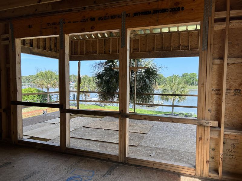 Spacious, unfurnished interior of a new home in , Isle Of Palms (Image 18).