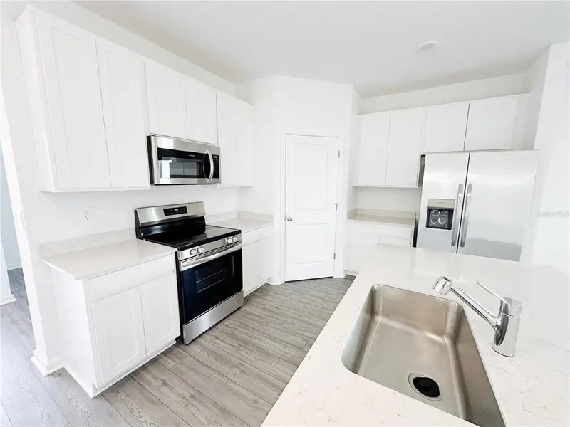 Furnished interior view inside a new home in , Ocala (Image 4).