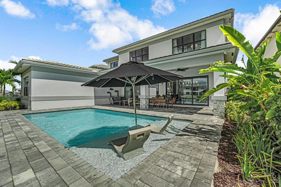 Exterior details and patio area of a home in Apex at Avenir, Palm Beach Gardens (Image 39).