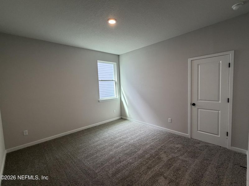 Spacious, unfurnished interior of a new home in Reserve East, Flagler Beach (Image 23).
