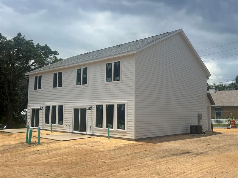 Front exterior of a new home in , Mount Dora, FL, highlighting curb appeal (Image 20).