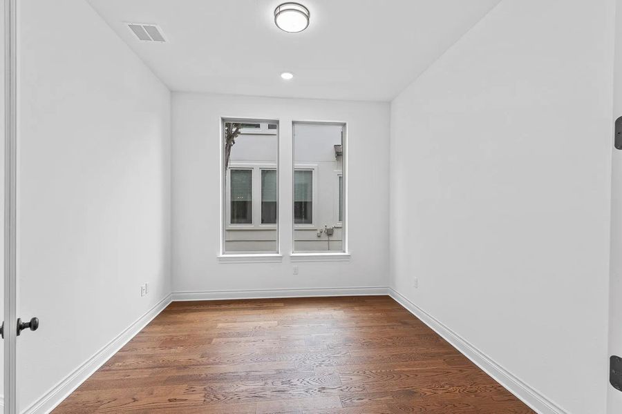 Spacious, unfurnished interior of a new home in The Hollows Sanctuary - 85', Jonestown (Image 17). Spacious, unfurnished interior of a new home in The Hollows Sanctuary - 85', Jonestown (Image 17).