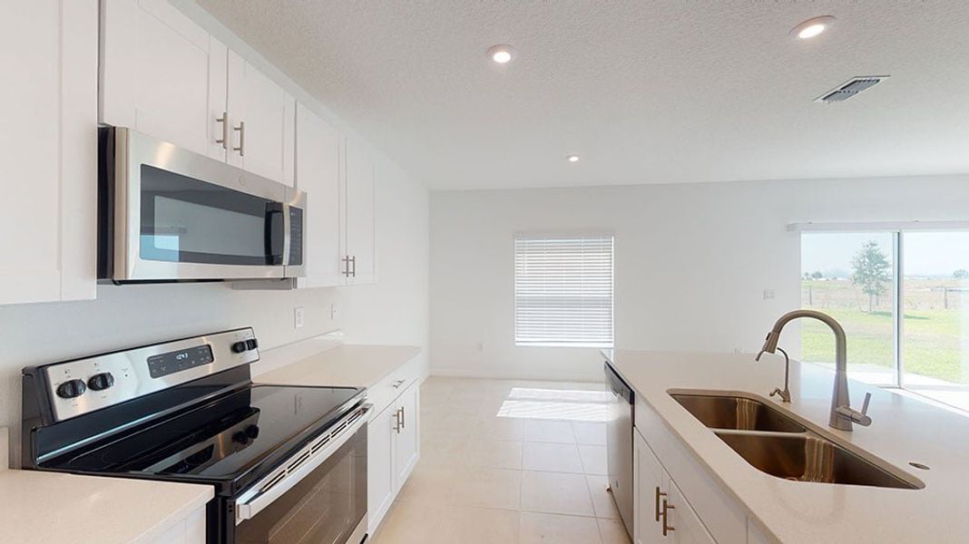 Representative furnished interior of a home built from the Kingfisher by Taylor Morrison in Solena, North Fort Myers (Image 5).