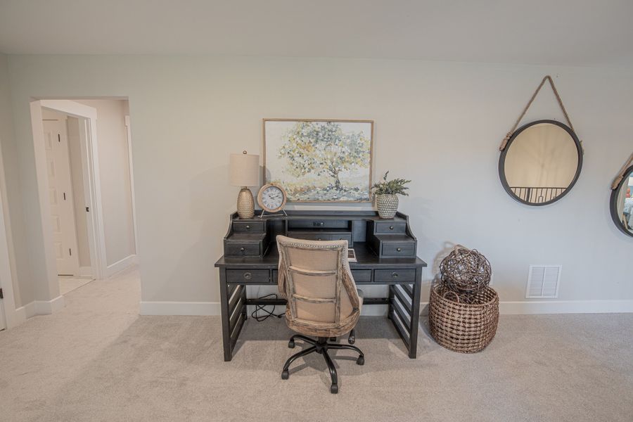 Representative furnished interior of a home built from the Huntington by Grant & Co in White Oak, Arlington (Image 33).