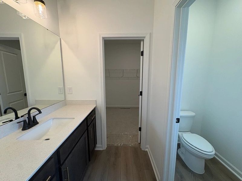 Primary Bath featuring AW Collection® Oxford - Organic textures paired with bold, classic design. Primary Bath featuring AW Collection® Oxford - Organic textures paired with bold, classic design.