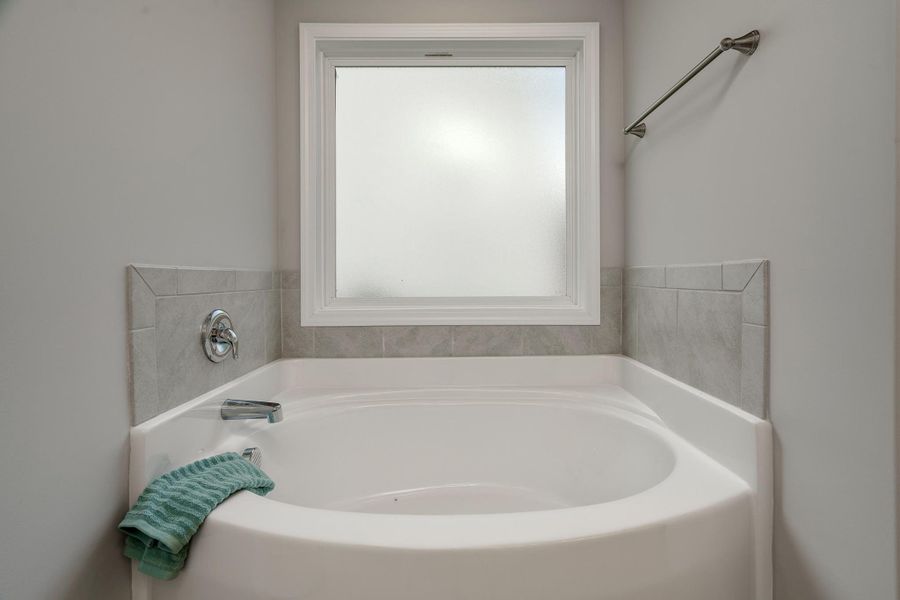 Representative furnished interior of a home built from the Chatham A by JC Jackson Homes,LLC in Heritage Pointe, Newport (Image 9).