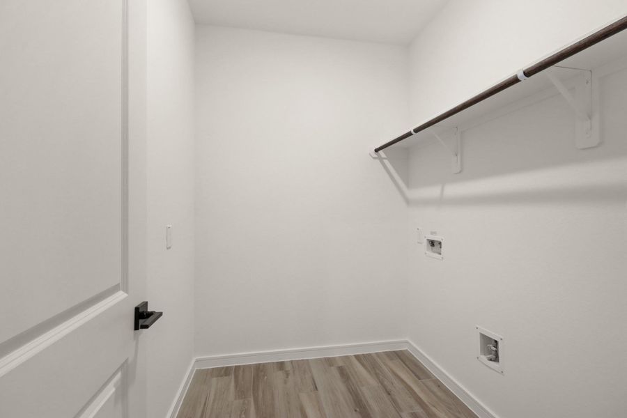 Laundry room (*Photo not of actual home and used for illustration purposes only.)