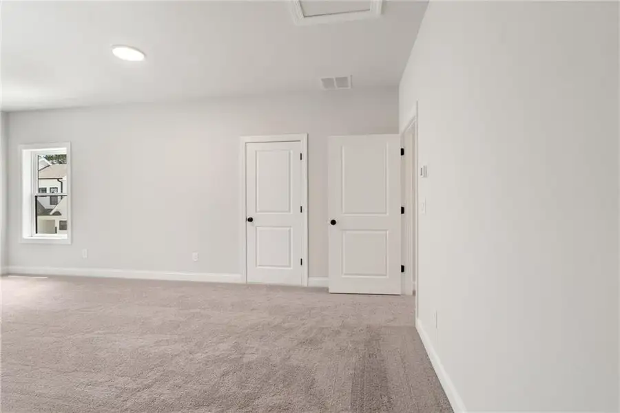 Spacious, unfurnished interior of a new home in Promenade at Sawnee Village, Cumming (Image 28).