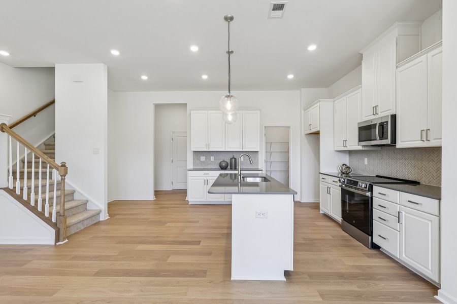 Furnished interior view inside a new home in Terraces at the Exchange, Fort Mill (Image 7).