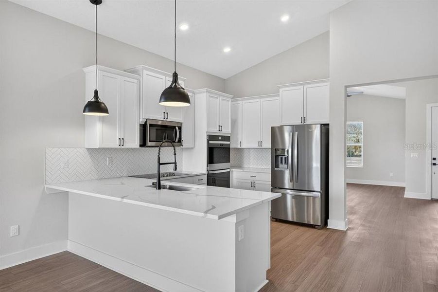 Furnished interior view inside a new home in Stables at Cary Forest, Bryceville (Image 13).