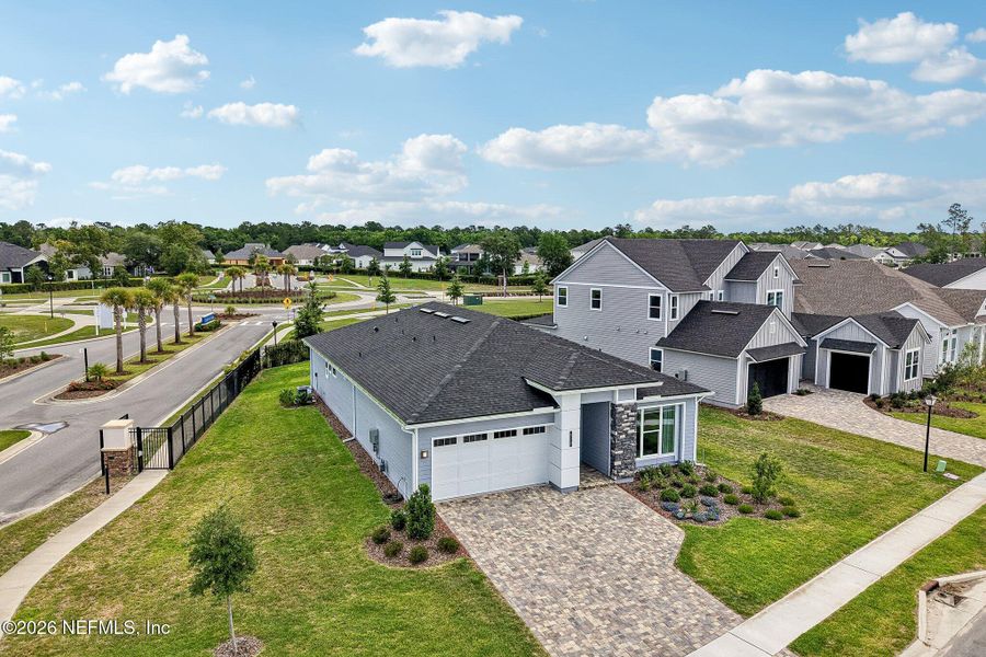 Front exterior of a new home in SilverLeaf, St. Augustine, FL, highlighting curb appeal (Image 32). Front exterior of a new home in SilverLeaf, St. Augustine, FL, highlighting curb appeal (Image 32).