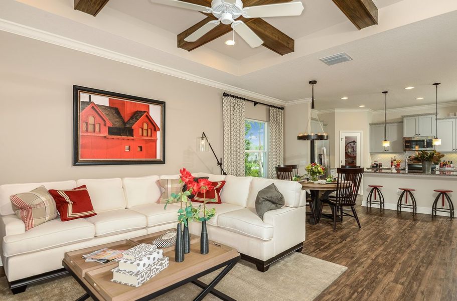 Representative furnished interior of a home built from the Fresh Spring by Neal Communities in SkySail, Naples (Image 8).