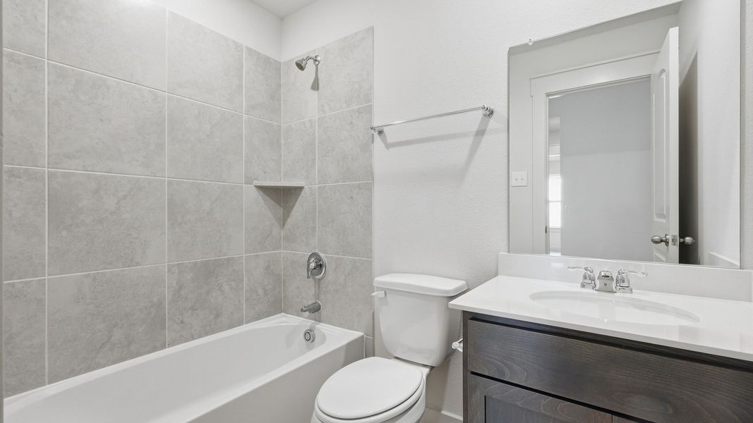Furnished interior view inside a new home in Patriot Estates, Venus (Image 10).