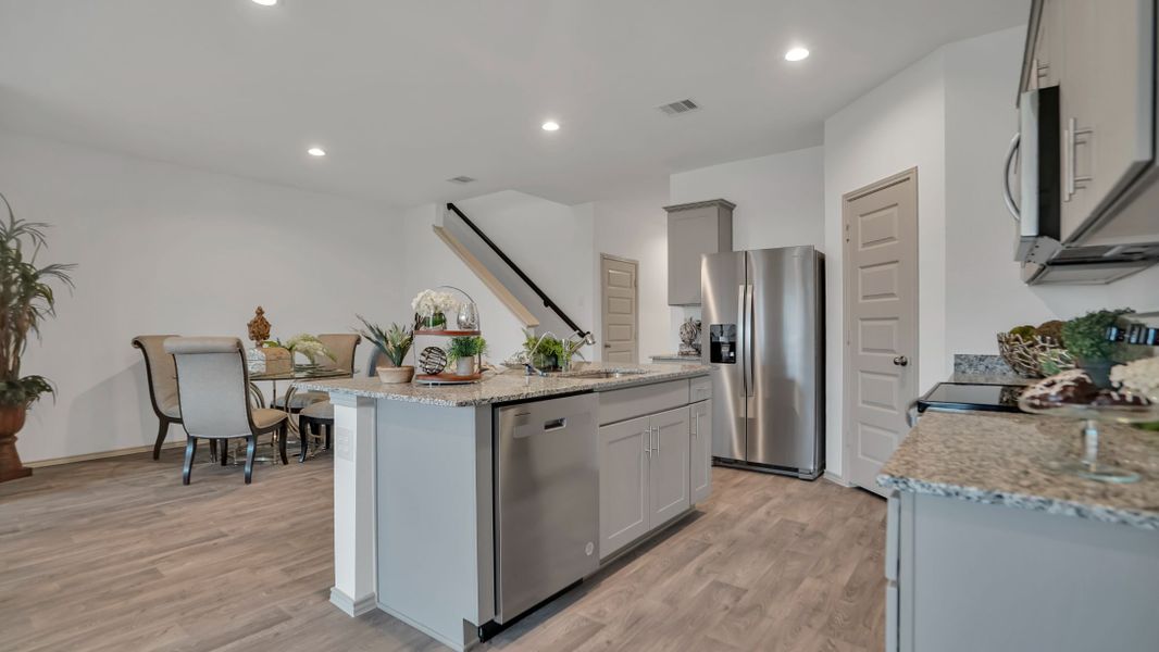 Representative furnished interior of a home built from the MITCHELL by D.R. Horton in Westward Pointe, Sealy (Image 10).