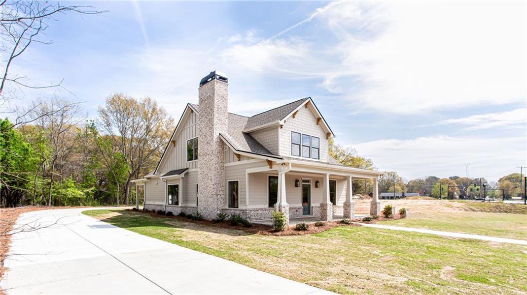 Front exterior of a new home in , Grayson, GA, highlighting curb appeal (Image 25).