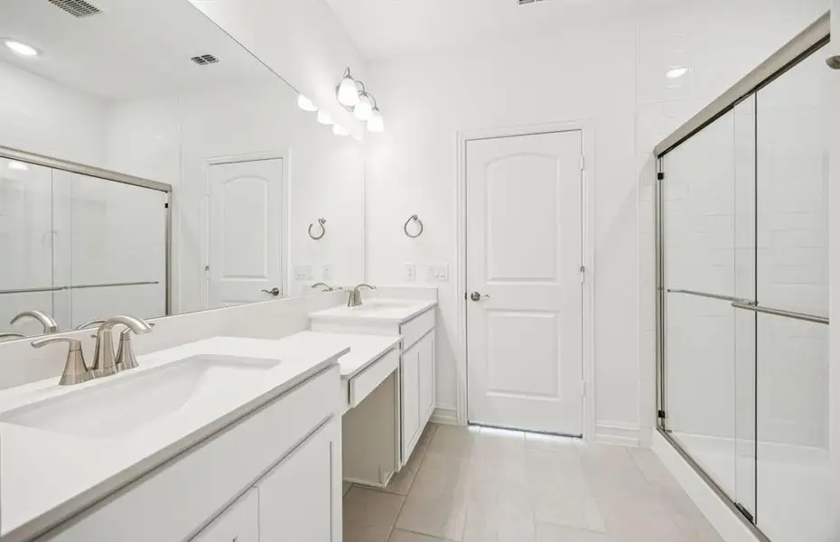 Owner's bath with great cabinet space