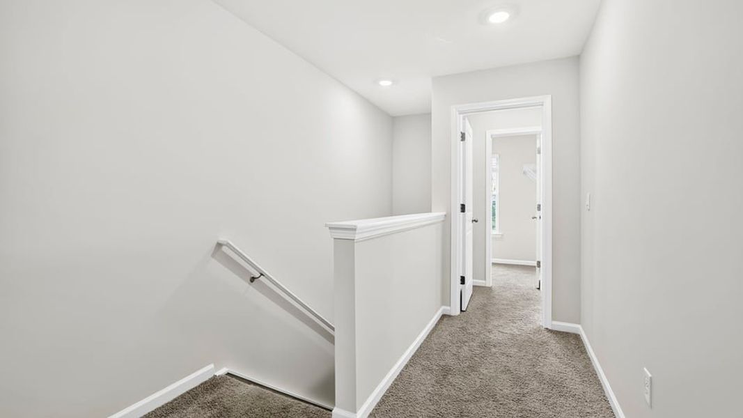 Spacious, unfurnished interior of a new home in Tanglewood Townes, Greenville (Image 23).