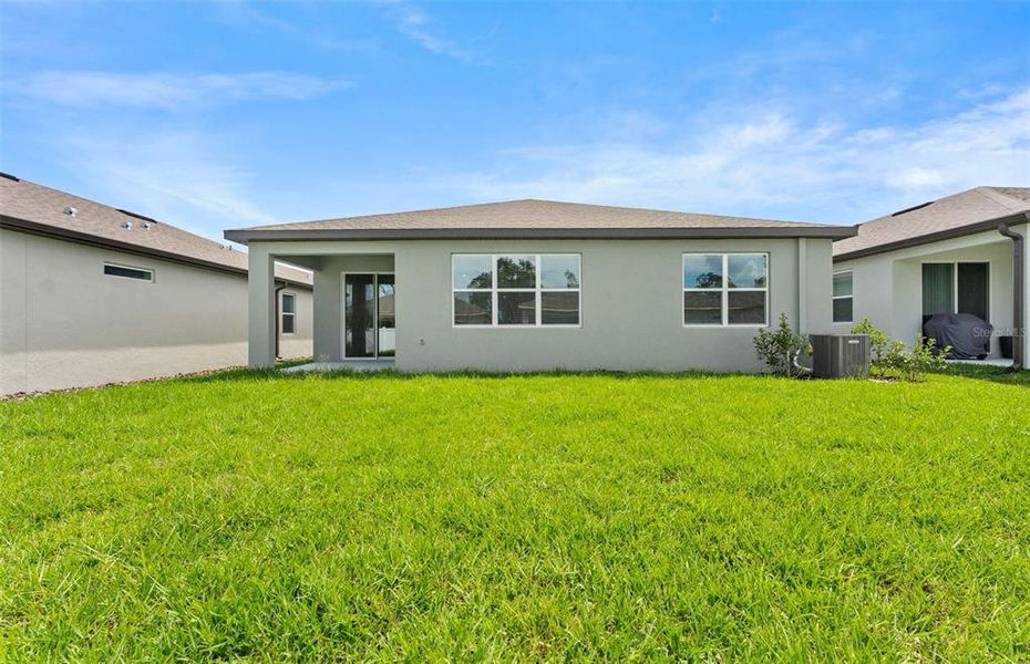 Front exterior of a new home in Pioneer Ranch, Ocala, FL, highlighting curb appeal (Image 2). Front exterior of a new home in Pioneer Ranch, Ocala, FL, highlighting curb appeal (Image 2).