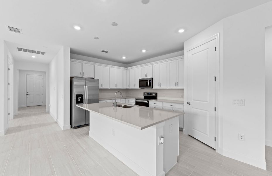 Furnished interior view inside a new home in Legacy Groves, Nokomis (Image 9).