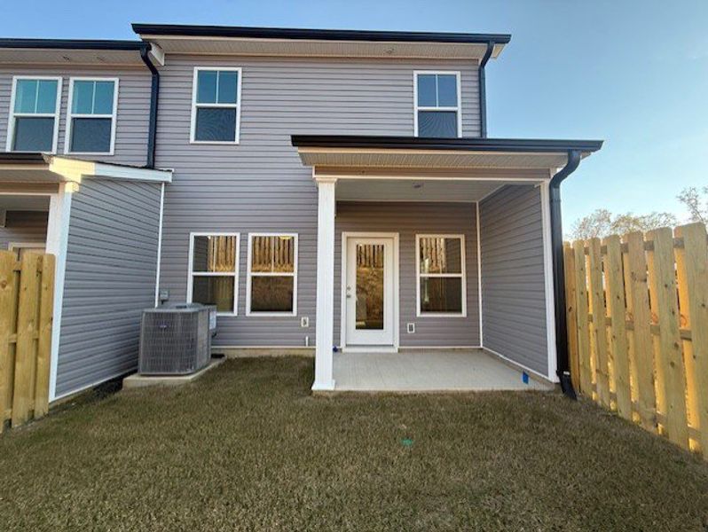 Exterior details and patio area of a home in Caroleton Townhomes, Grovetown (Image 3). Exterior details and patio area of a home in Caroleton Townhomes, Grovetown (Image 3).