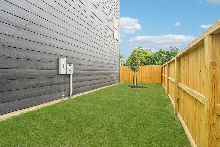 Exterior details and patio area of a home in , Houston (Image 4).
