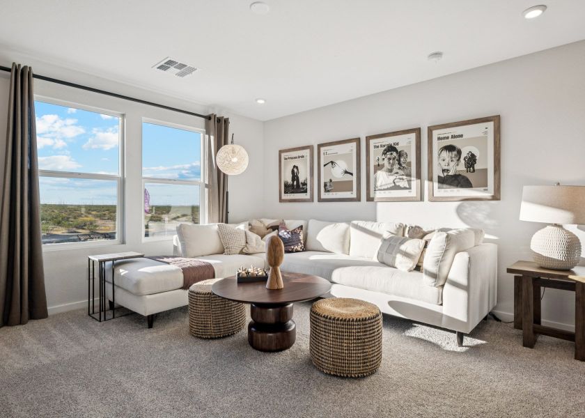 A living room with a large window.