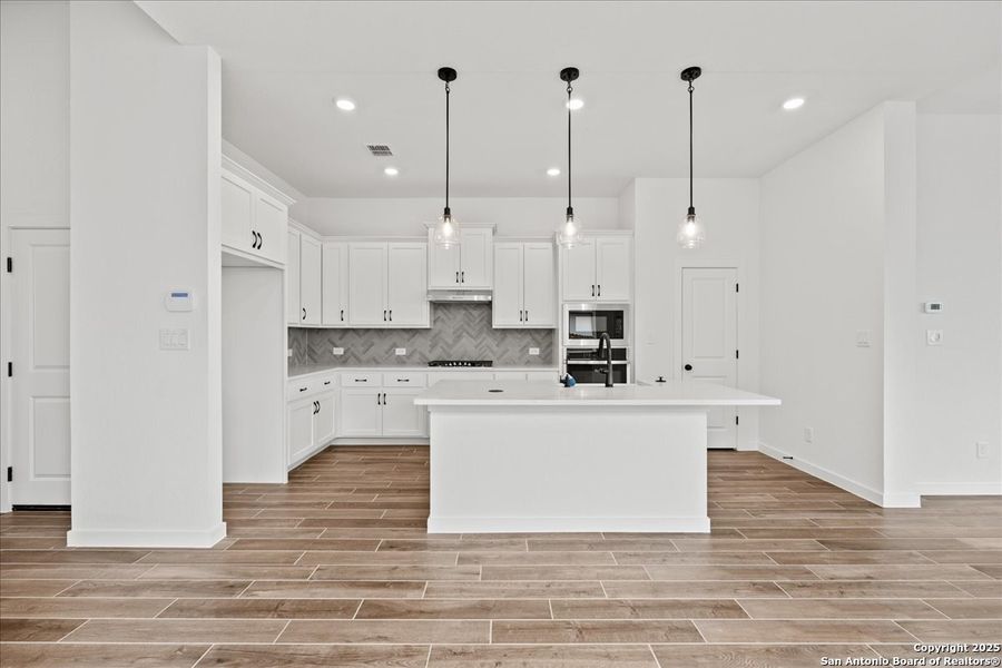 Furnished interior view inside a new home in Stream Waters, Seguin (Image 10).