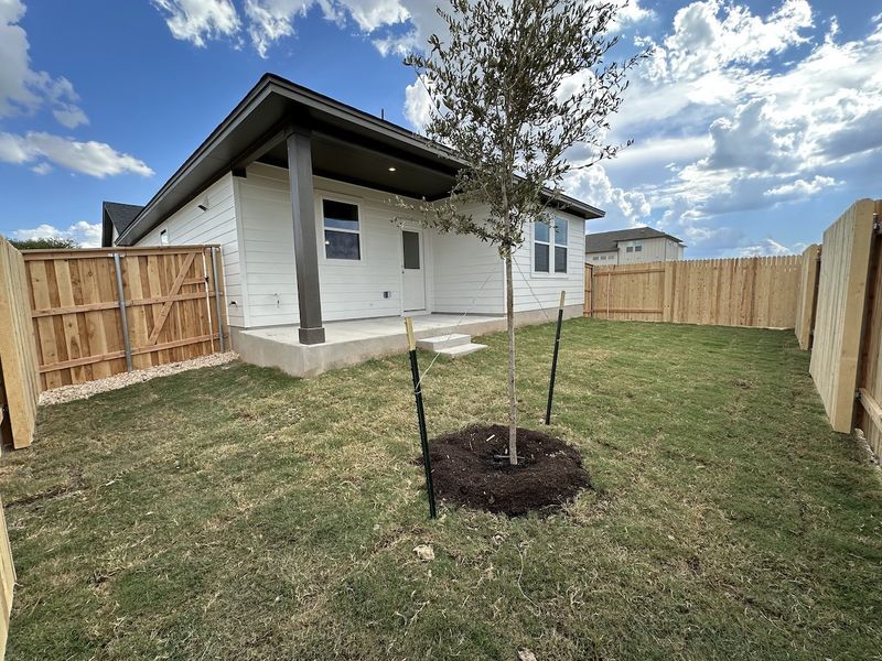 Exterior details and patio area of a home in Crosswinds, Kyle (Image 11).