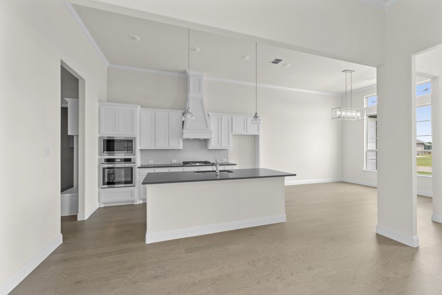 Representative furnished interior of a home built from the Wildwood SE by Sandlin Homes in Settler's Glen, New Fairview (Image 7).