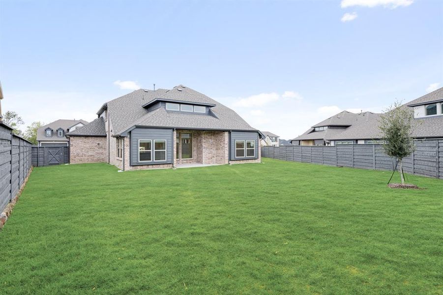 Exterior details and patio area of a home in Union Park Classic 55, Little Elm (Image 4).