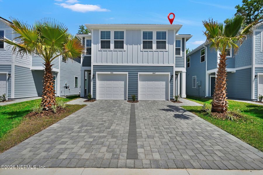 Front exterior of a new home in Baxley Villas, Middleburg, FL, highlighting curb appeal (Image 1). Front exterior of a new home in Baxley Villas, Middleburg, FL, highlighting curb appeal (Image 1).