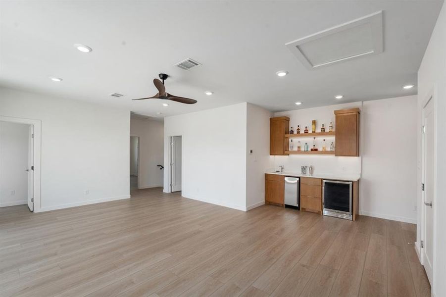 2nd floor family room with full bath, & wet bar.