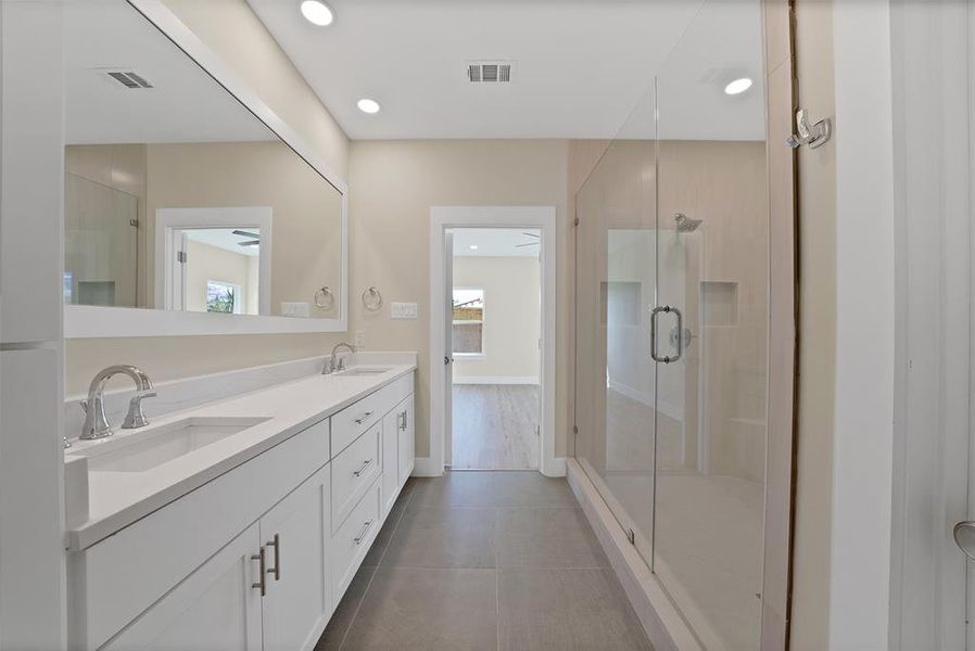 Furnished interior view inside a new home in , The Colony (Image 12).