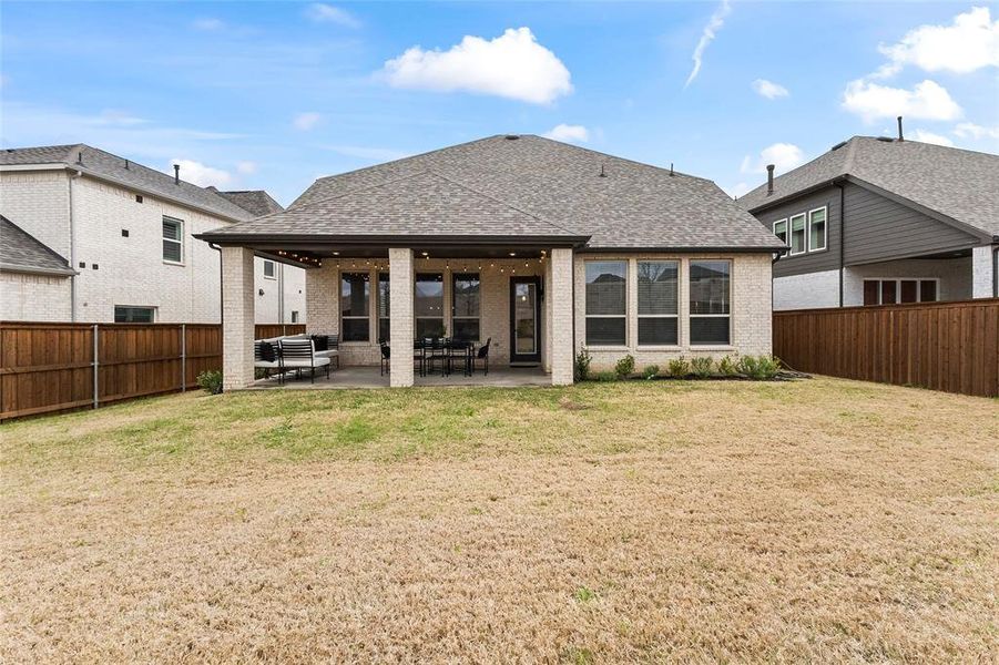 Exterior details and patio area of a home in Trinity Falls, McKinney (Image 3).