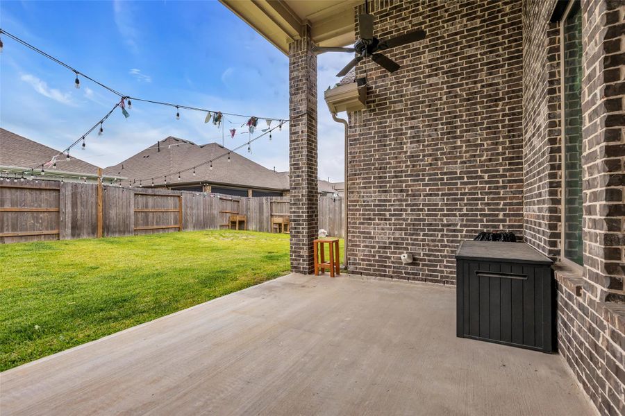 Exterior details and patio area of a home in , Conroe (Image 24).