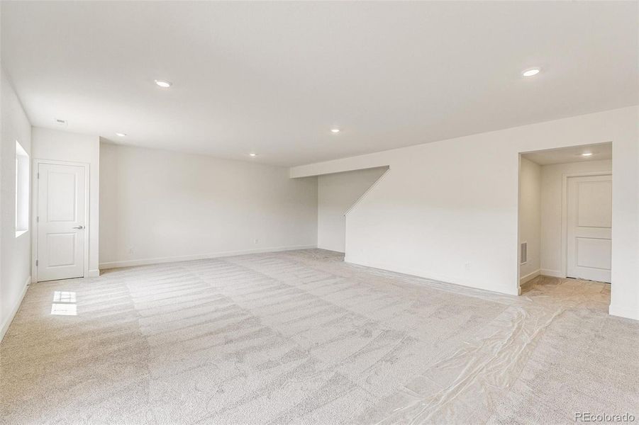 Spacious, unfurnished interior of a new home in Terrain Oak Valley, Castle Rock (Image 32).